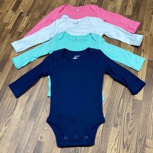 Carter’s baby girl long sleeve onesie. Bundle of four. Size 3 months.
